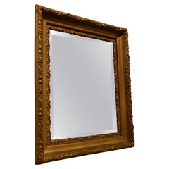 Miroir rectangulaire doré de belle qualité