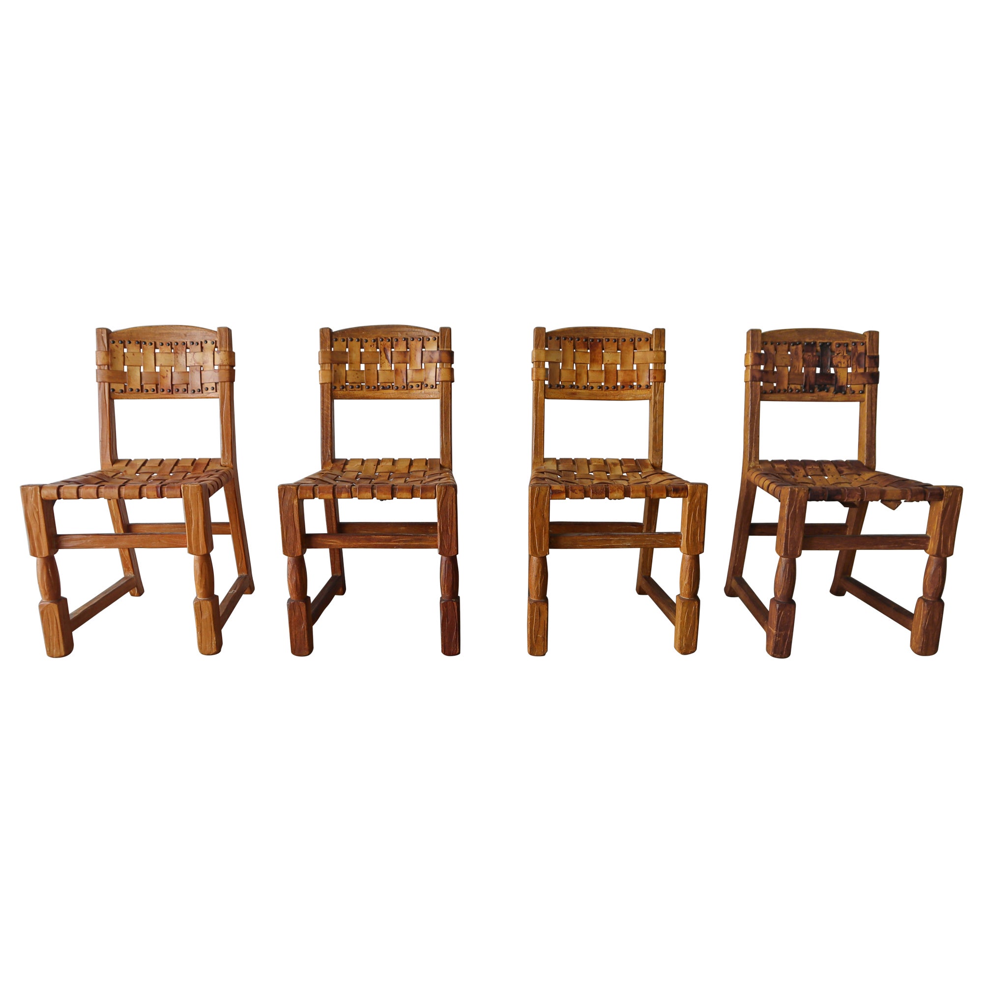 Ensemble de quatre chaises de salle à manger en cuir tissé en vente