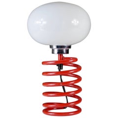 Red spring table lamp attributed to Ingo Maurer, 1970s