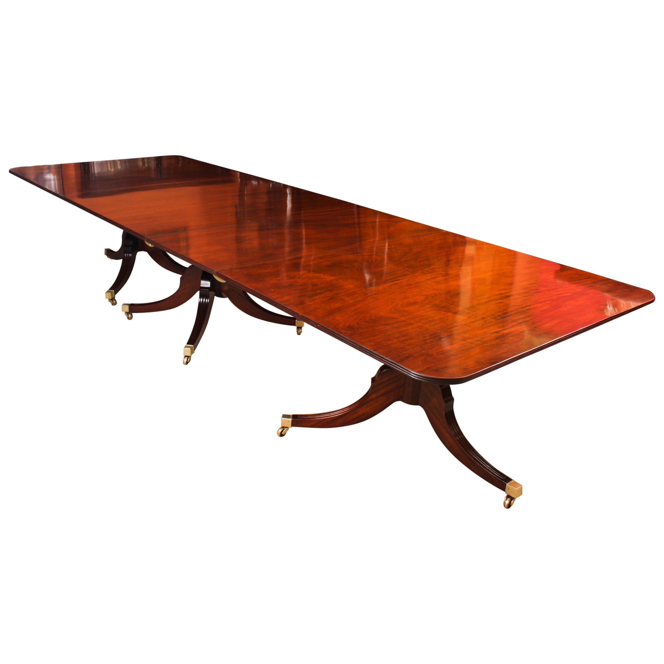 Ancienne table de salle à manger de style Régence à trois piliers en acajou flammé de 14 pieds 19ème siècle en vente