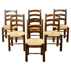 Vintage Set of 6 Georges Robert wood and straw chairs, made in France, 1950s