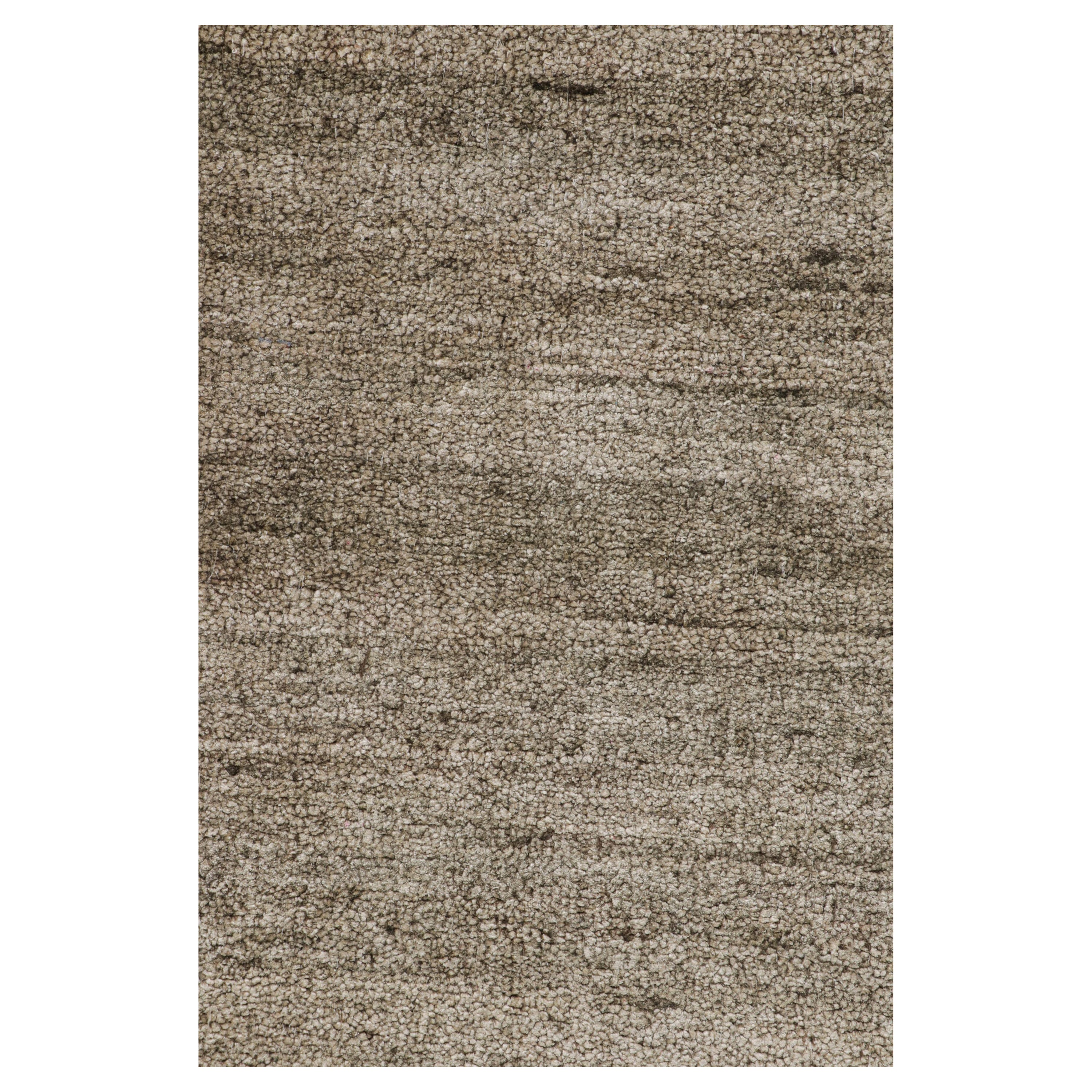Hand-knotted in silk, this 9x10 contemporary rug from Rug & Kilim’s Texture of Color line is an inventive take on solid rugs with movement in its subtle striae. 

On the Design: 

The collection enjoys an inventive take on plain rugs, and a