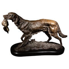 Grand bronze du 19ème siècle représentant un chien de chasse avec un faisan