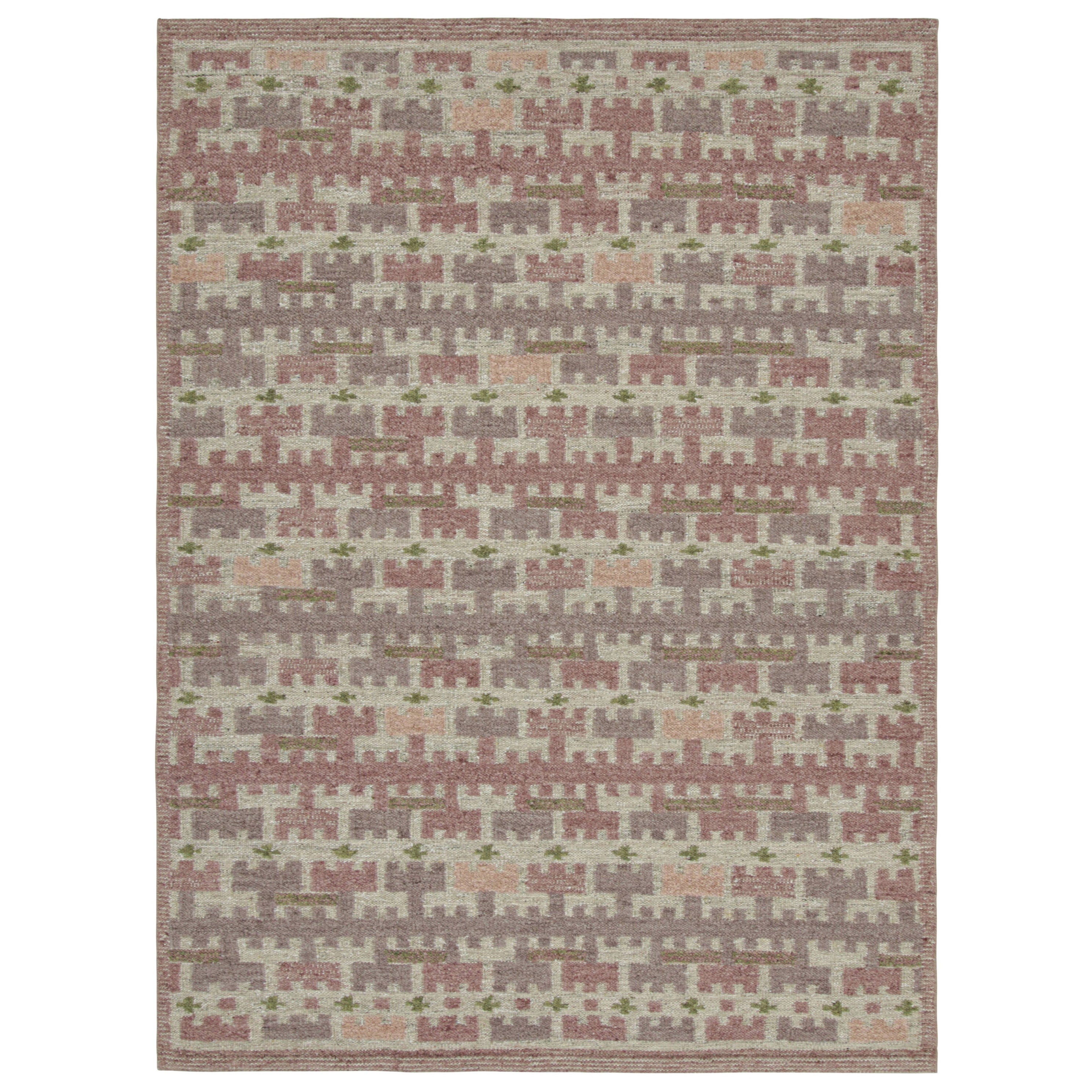 Rug & Kilim's Teppich im skandinavischen Stil mit rosa und lila geometrischen Mustern