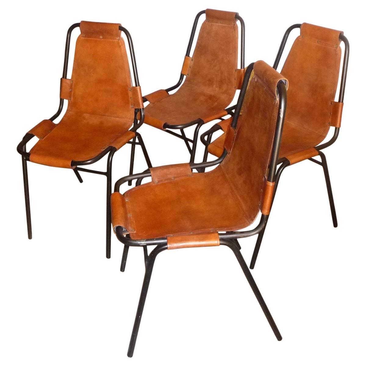 Charlotte Perriand, Four "Les Arcs" Cognac Leather Chairs, 1960s