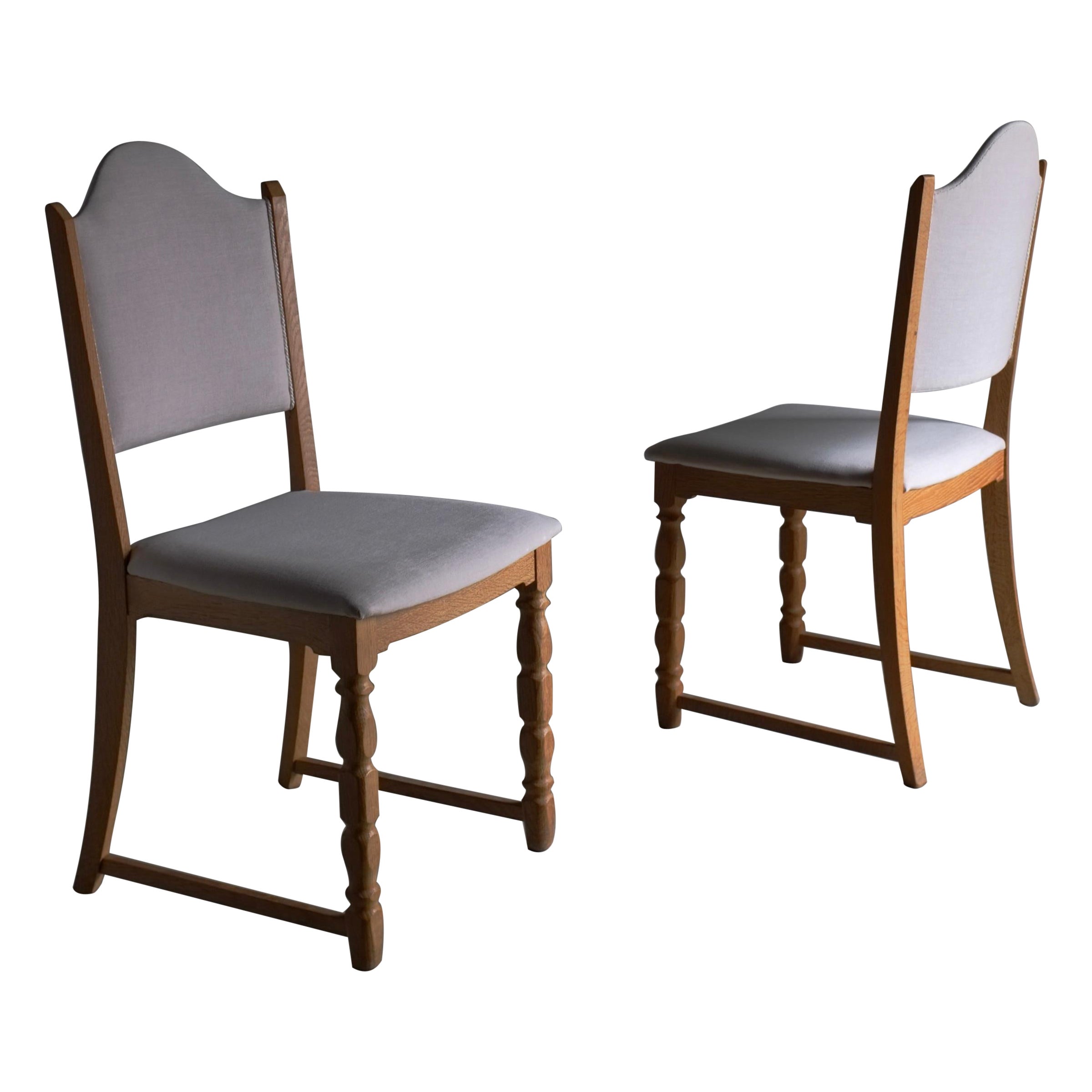 Set of 2 Carved Oak Chairs, Henning Kjaernulf, Denmark 1950s