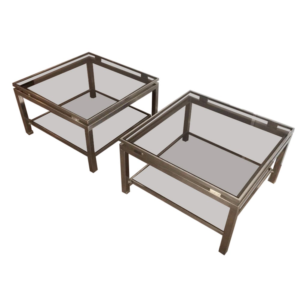 Pair of brushed steel side tables with smoked glass by Guy Lefèvre  For Sale