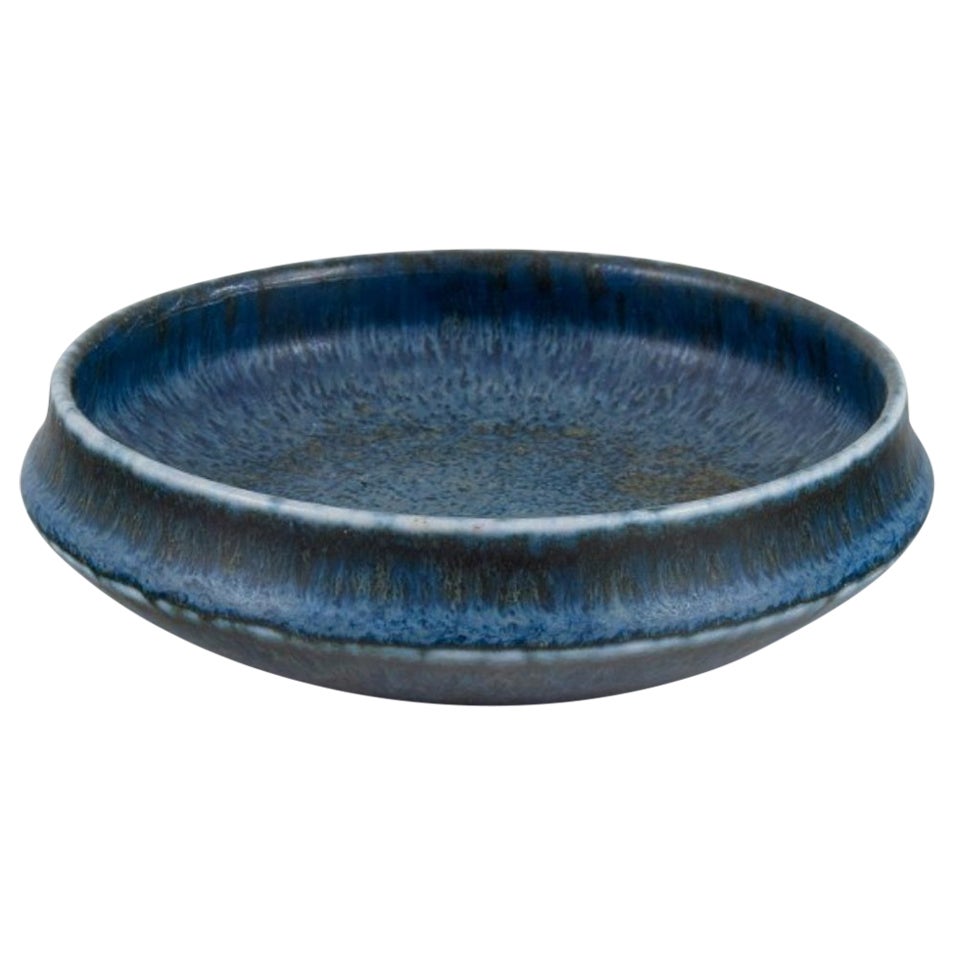 Carl Harry Stålhane for Rörstrand. Ceramic bowl with blue-toned glaze For Sale