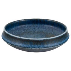 Carl Harry Stålhane for Rörstrand. Ceramic bowl with blue-toned glaze