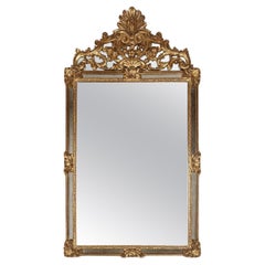 Retro Large elegant gilted mirror with stunning ornamentation on the top, Deknudt 