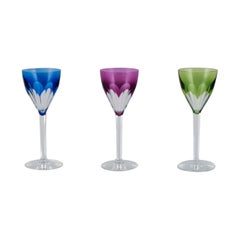 Val St. Lambert, Belgium. Three red wine glasses in faceted crystal. 1930s/40s.