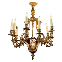 Lustre Louis XV en bronze doré et cristal