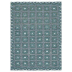 Rug & Kilim’s Scandinavian Rug with Teal and Blue Geometric Patterns