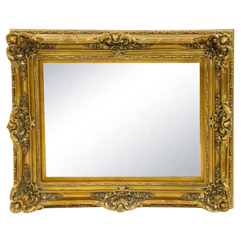 Antique Ornately Carved Giltwood Frame Hanging Wall Mirror For Sale