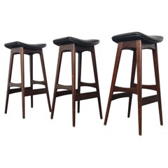 Retro Set Of Three Johannes Andersen Barstools In Black Leather