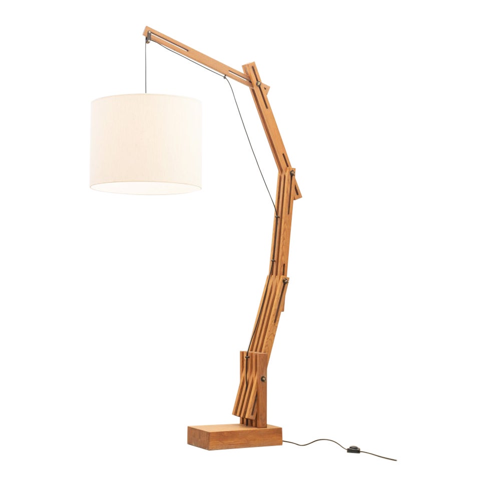 Large articulated floor lamp by Daniel Pigeon, France, 1970s For Sale