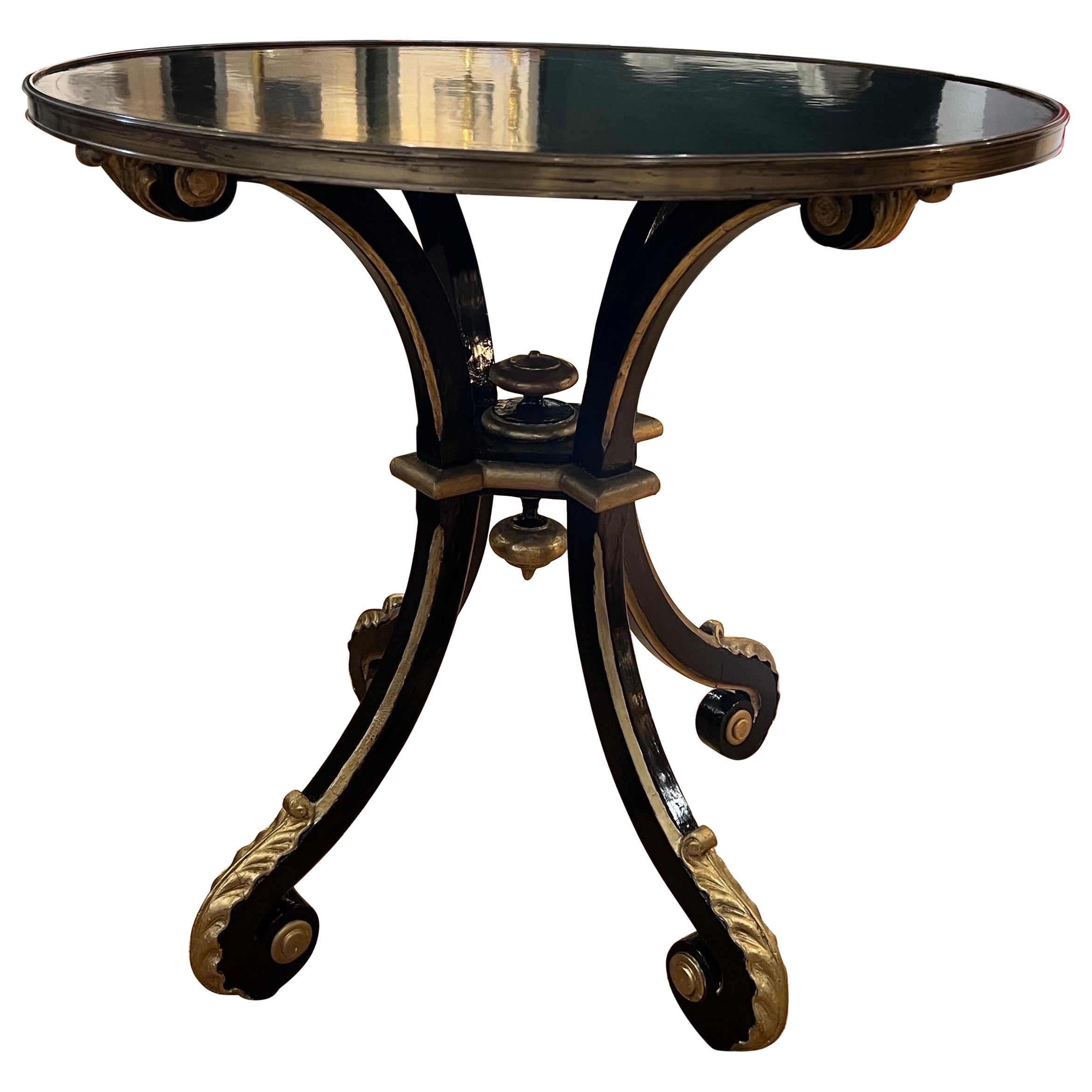 A Black lacquer and gold guéridon att. Maison Jansen  For Sale