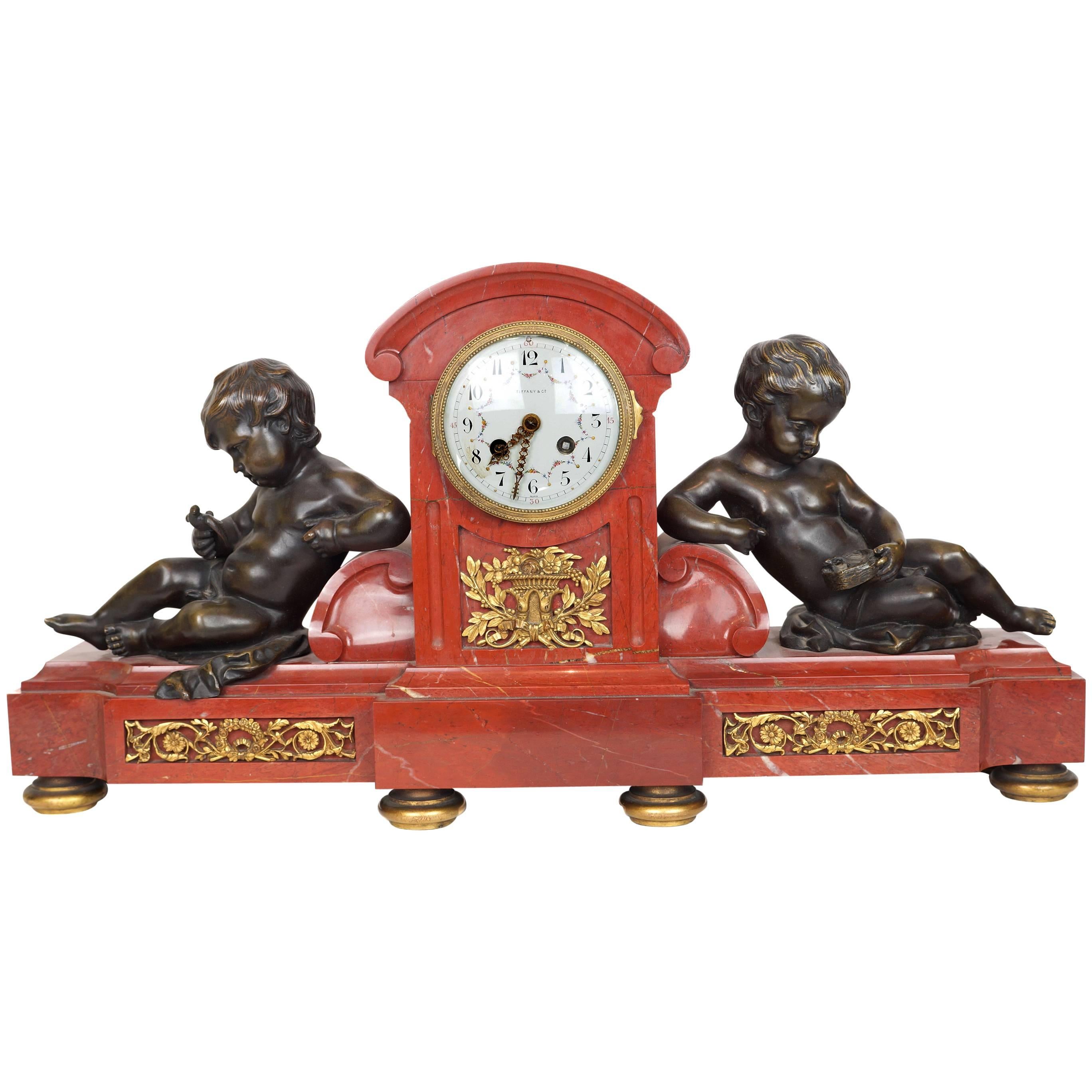 Rouge Marble and Bronze Mantel Clock by Tiffany and Company with Seated Putti