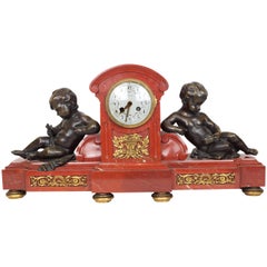 Antique Rouge Marble and Bronze Mantel Clock by Tiffany and Company with Seated Putti