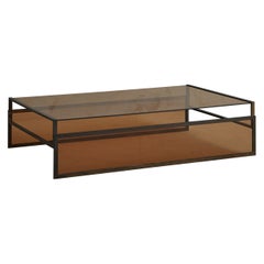 Table basse moderniste en verre ambré avec cadre en bloc de fer, France 20ème siècle