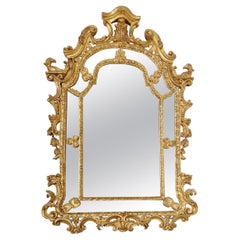 Miroir français de style rococo en bois doré Louis XV