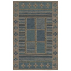 Rug & Kilim's Teppich im skandinavischen Stil in Blau mit bunten geometrischen Mustern
