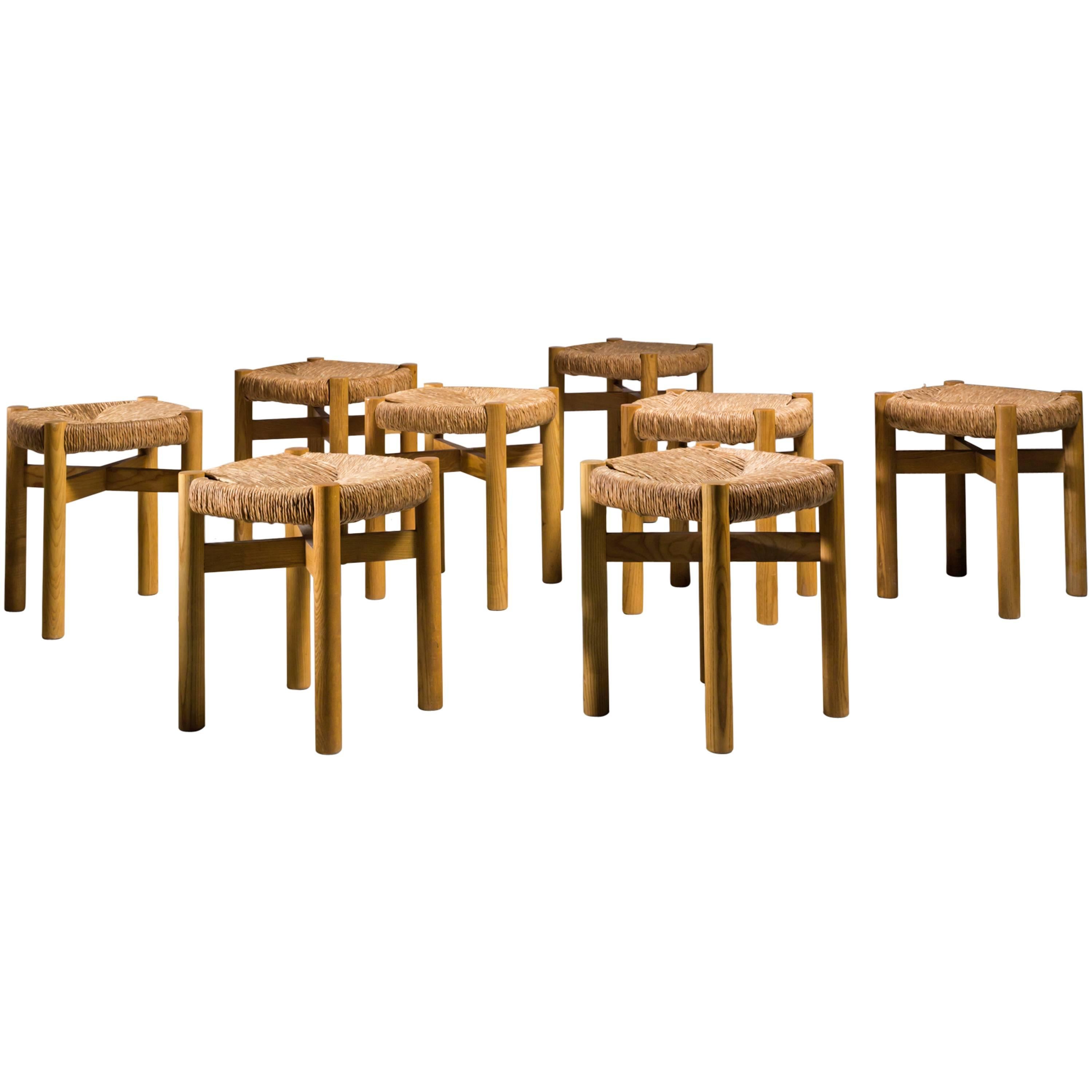 Charlotte Perriand Set of Eight Oak and Rush Méribel Stools, France, circa 1950 For Sale