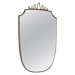 Vintage Mid-Century Modern Italian wall mirror, 1950, with brass frame and decoration