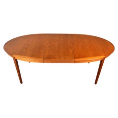 Danish Modern Oval Teak Dining Table + Two Leaves By Byrlund