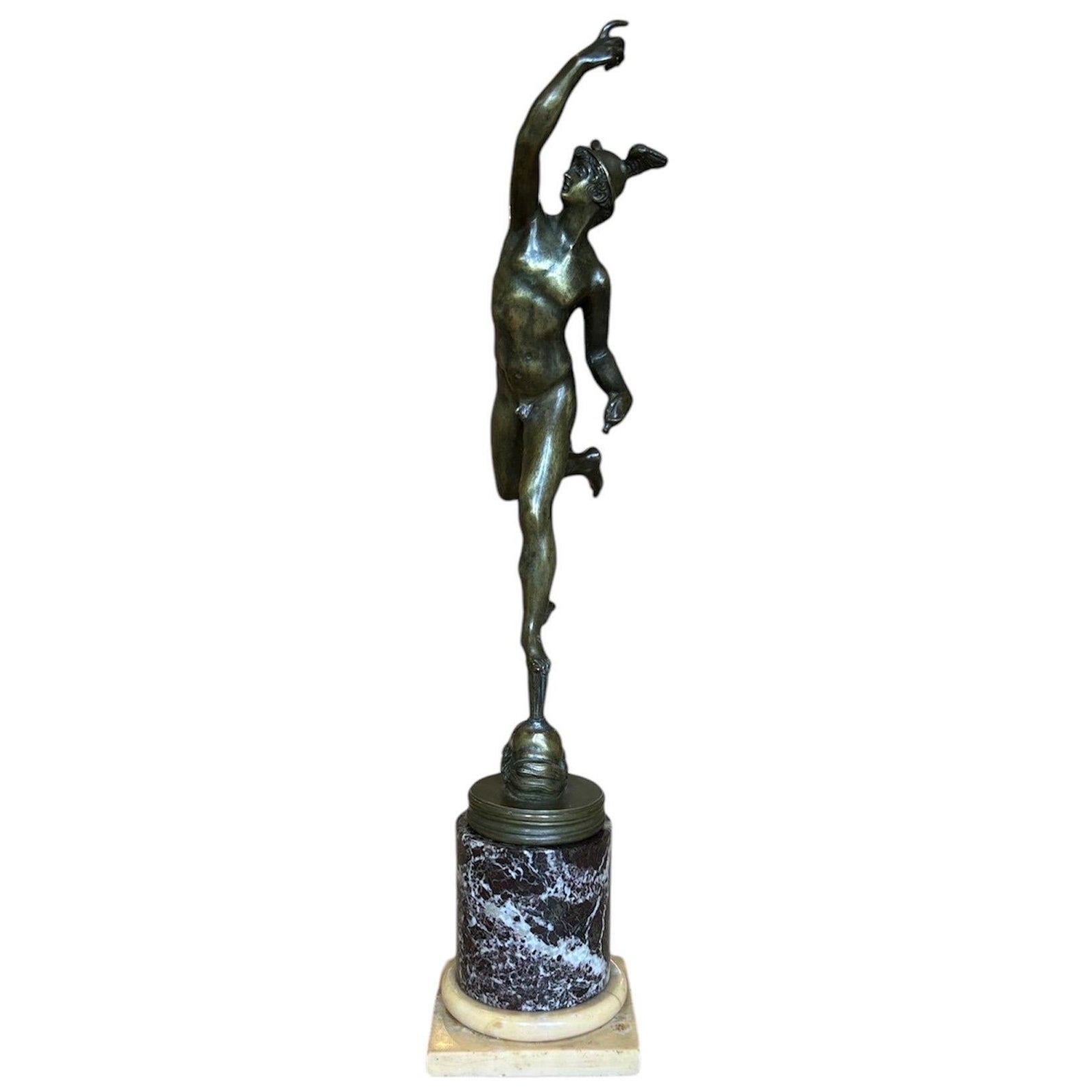 A grand tour bronze figure of Mercury ( Hermes ) on a marble collum For Sale