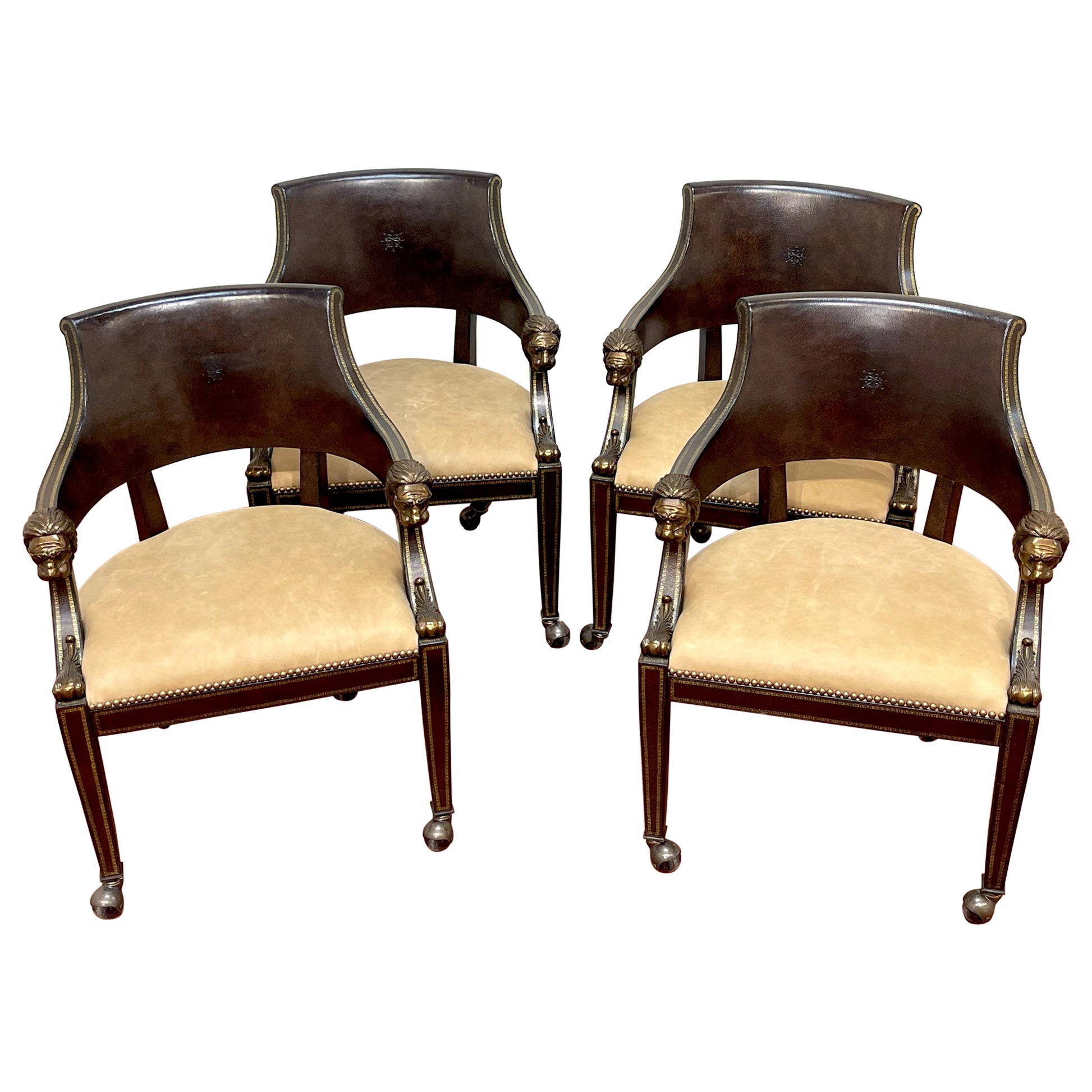 4 Gilt Leather Tooled Bronze Lion Head Armchairs on Castors, By Maitland-Smith