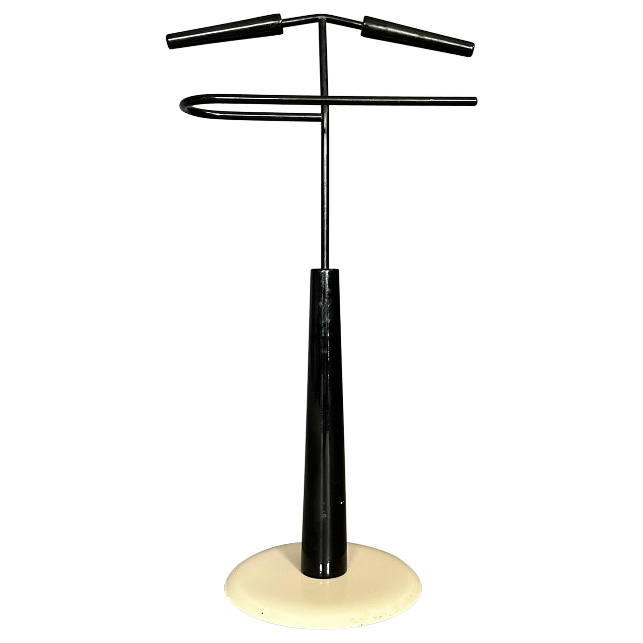 Valet stand, 1980s, Italian manufacture, in black wood and cream metal base