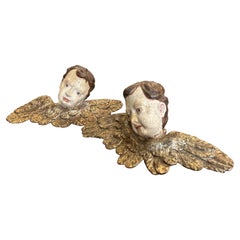 1750s Pair of Lacquered Wood Sculptures of Angel Heads with Wings