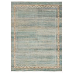 Tapis contemporain à motifs géométriques beige et bleu de Rug & Kilim