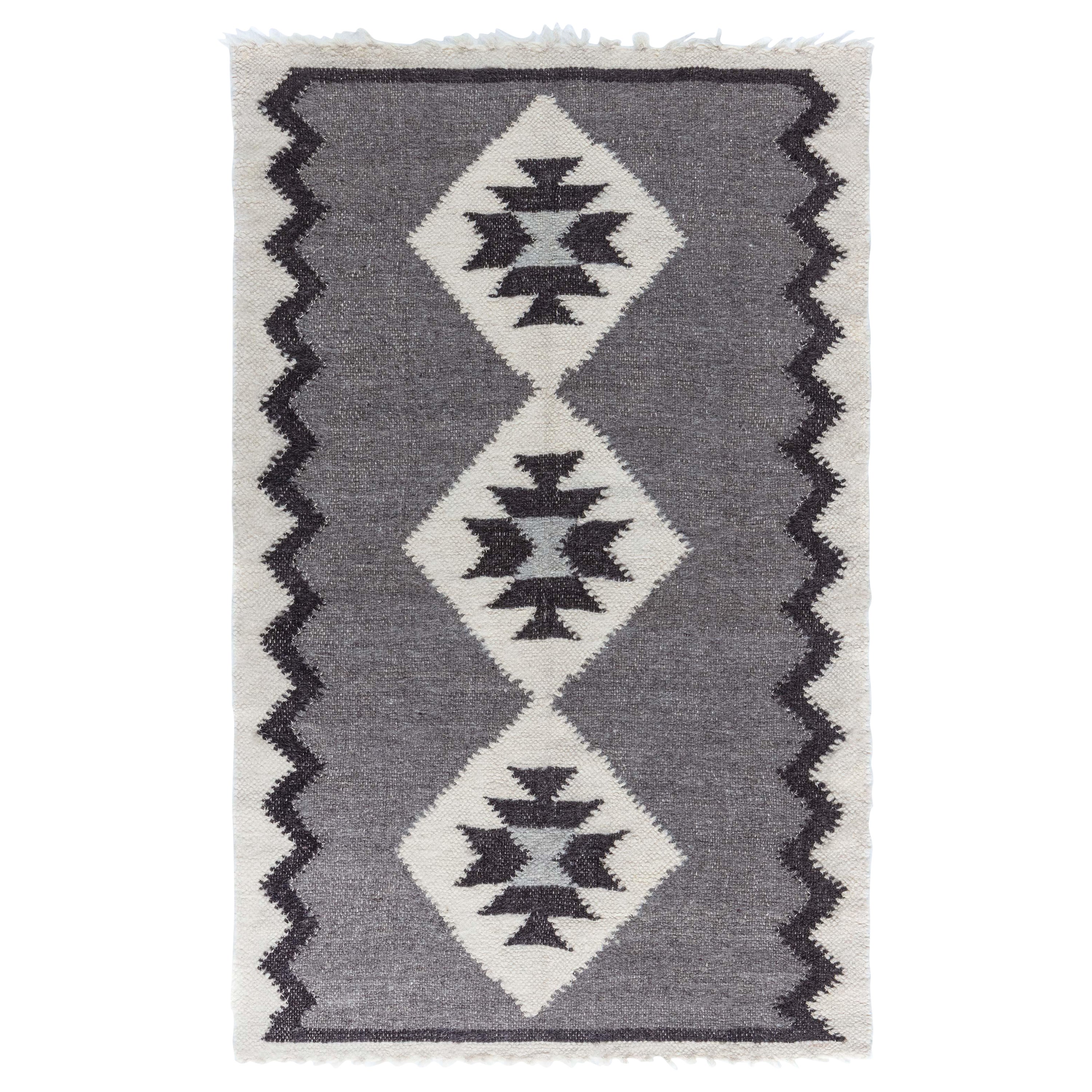 Tapis Folk Stamverband II en poils de chèvre de Doris Leslie Blau