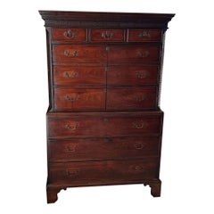 Antique A George III mahogany chest on chest with applied blind fretworadpated as a bar.