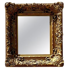 Miroir Vintage Regency en bois sculpté et doré