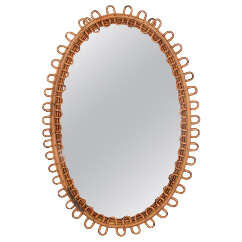 Miroir ovale italien en rotin en vente