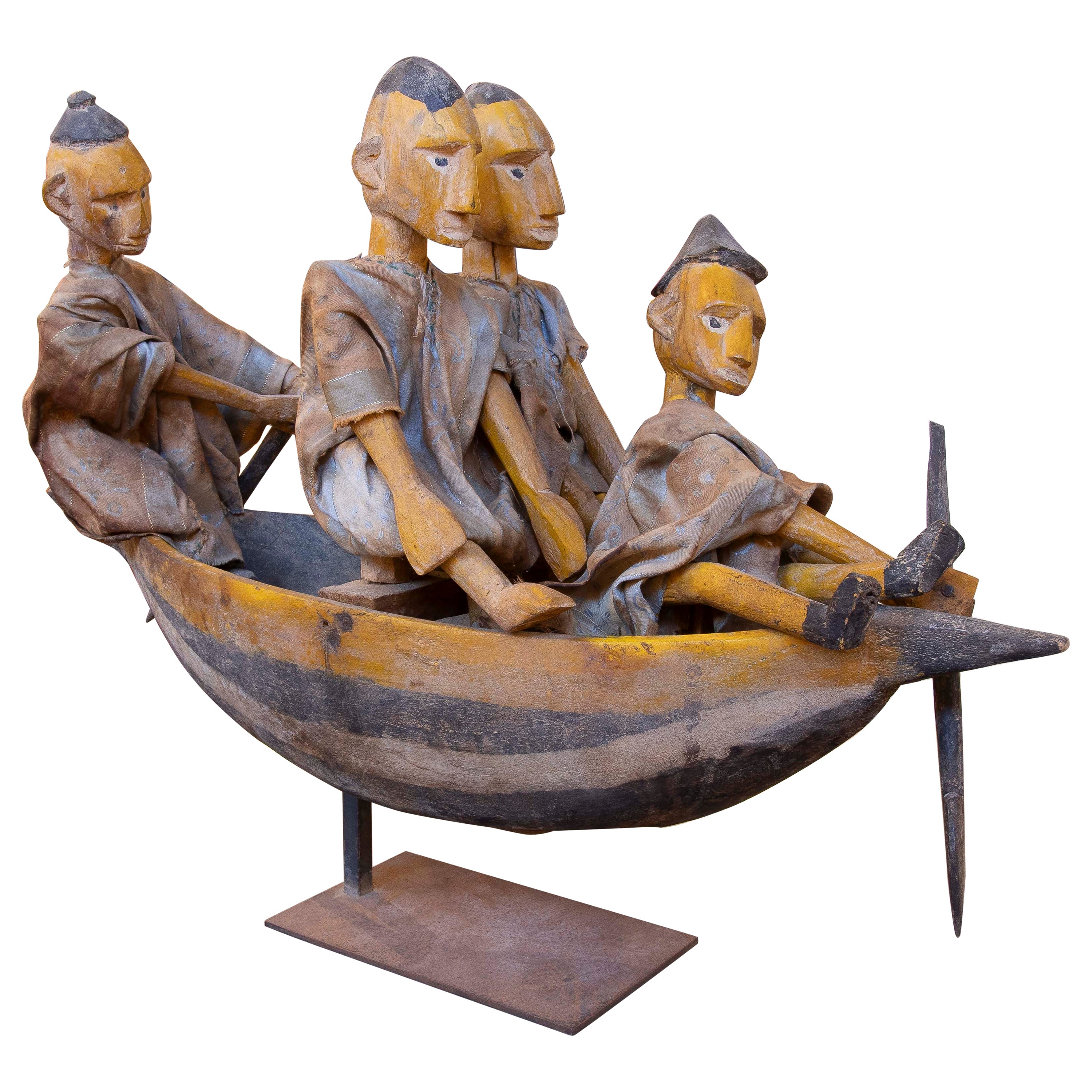 Sculpture Carved in Wood of Characters in a Boat with Cloth Costumes For Sale