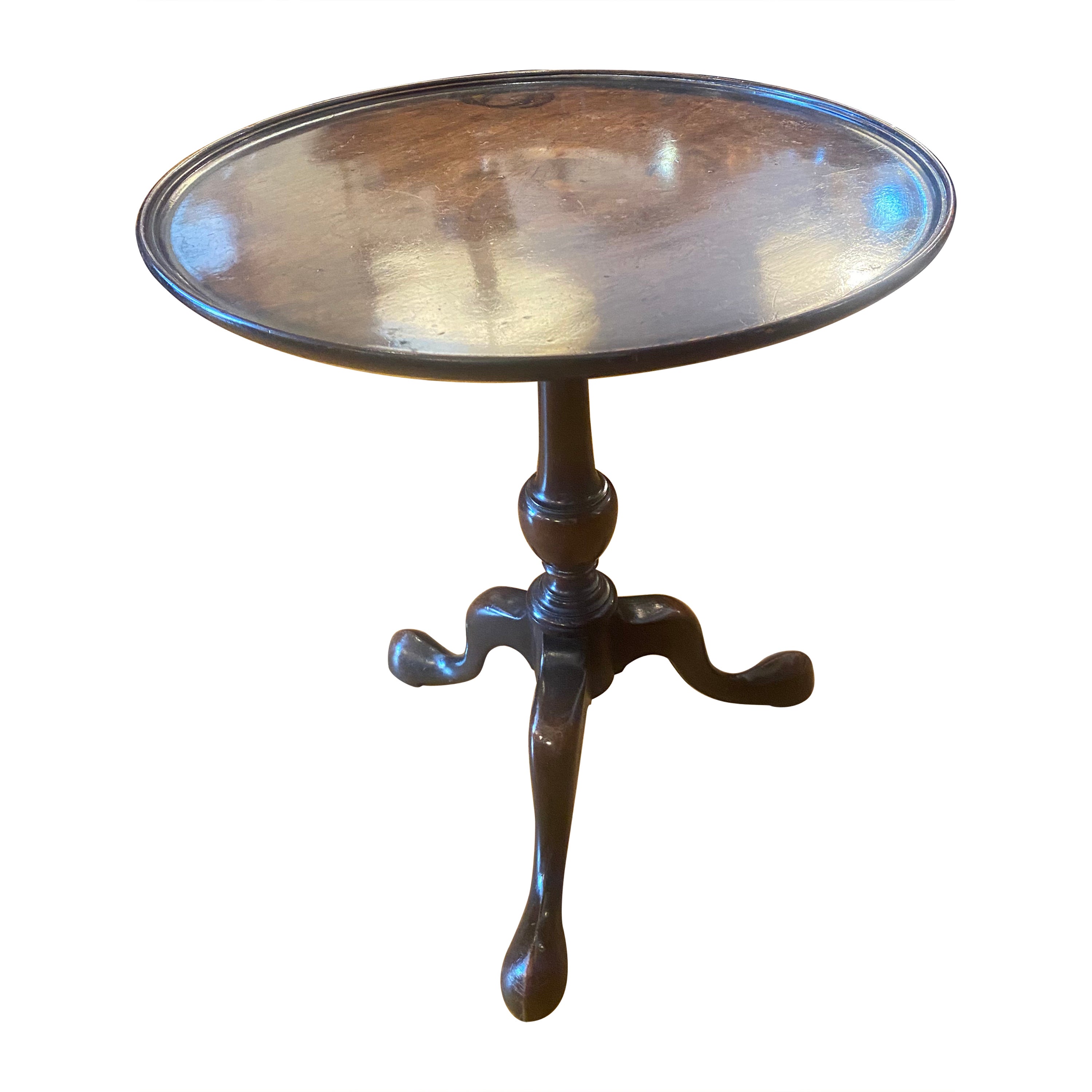 A George III mahogany side table with well patinated, dished, circular top. For Sale