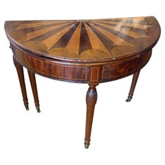 Antique A George III fan shaped, specimen wood, inlaid demilune flip top card table.