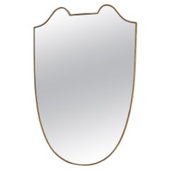 Retro Italian Brass Framed Shield Mirror in the style of Gio Ponti