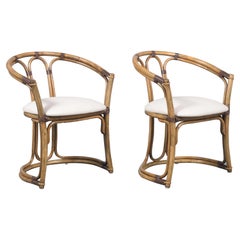 Paire de chaises baril en bambou restaurées avec tissu ivoire