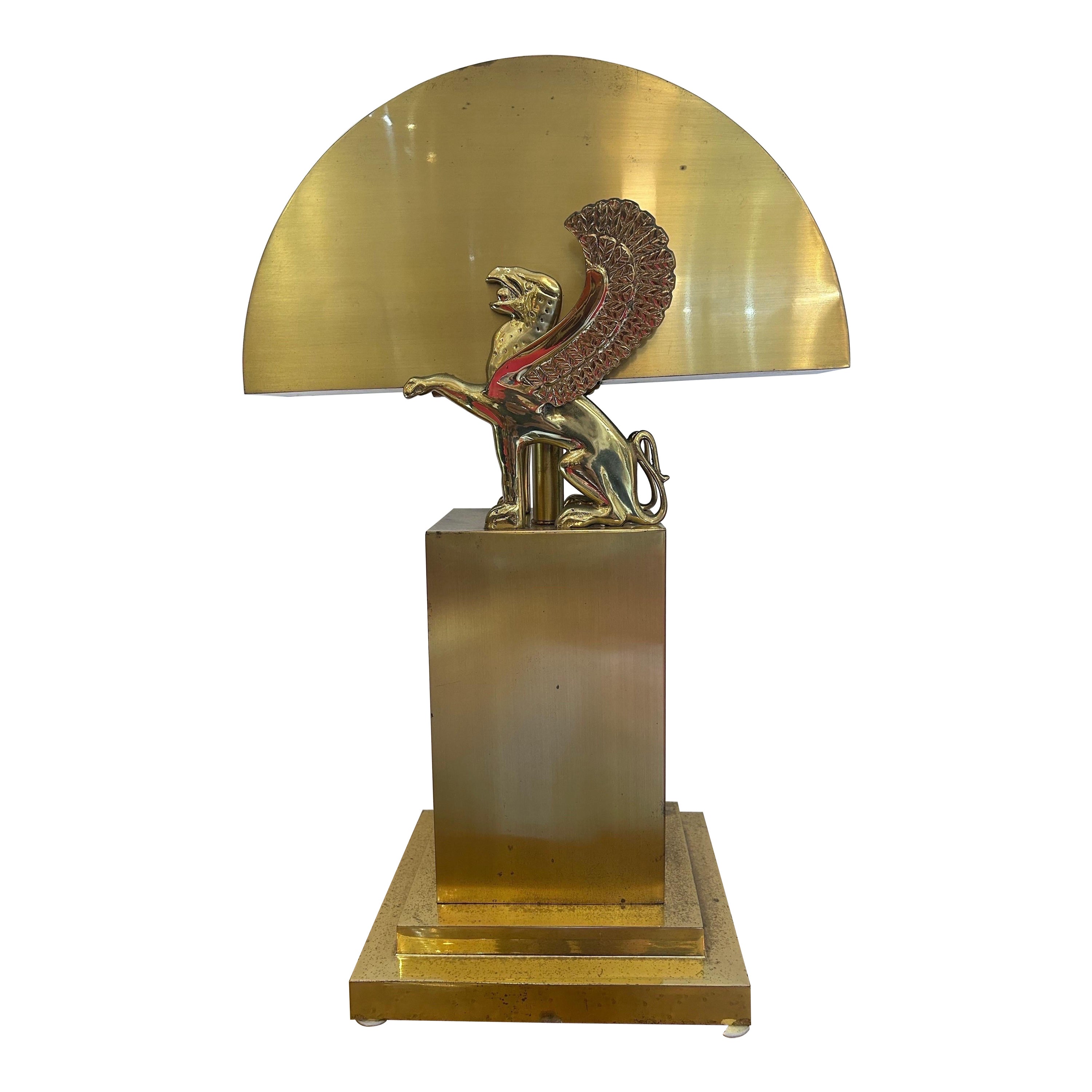 Gianni Versace style brass lamp with winged griffins.. For Sale