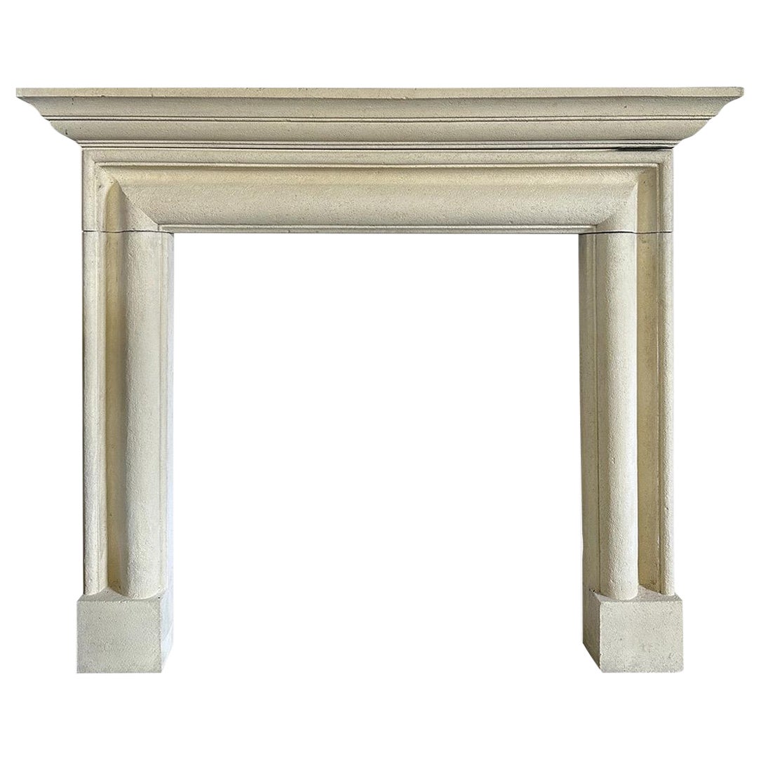 A Reclaimed Stone Bolection Fireplace Mantel  For Sale