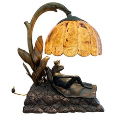 Used Maitland Smith frog prince lamp with pen shell shade