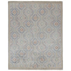 Rug & Kilim's Classic Ikats Stil Teppich mit blauen, goldenen und rostroten Mustern 