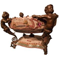 Cherub Centerpiece with Hand Painted Ceramic and solid bronze ormalou  