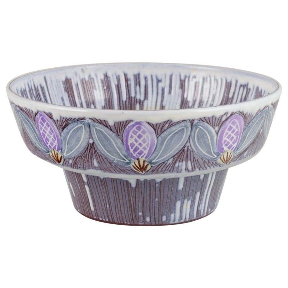 Olof Larsson for Laholm. Ceramic bowl with polychrome glaze and floral motif For Sale