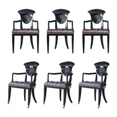 Retro A set of six Continental ebonised wood dining chairs, Italy, circa 1940